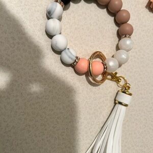 Elegant Beaded Bracelet with Tassel